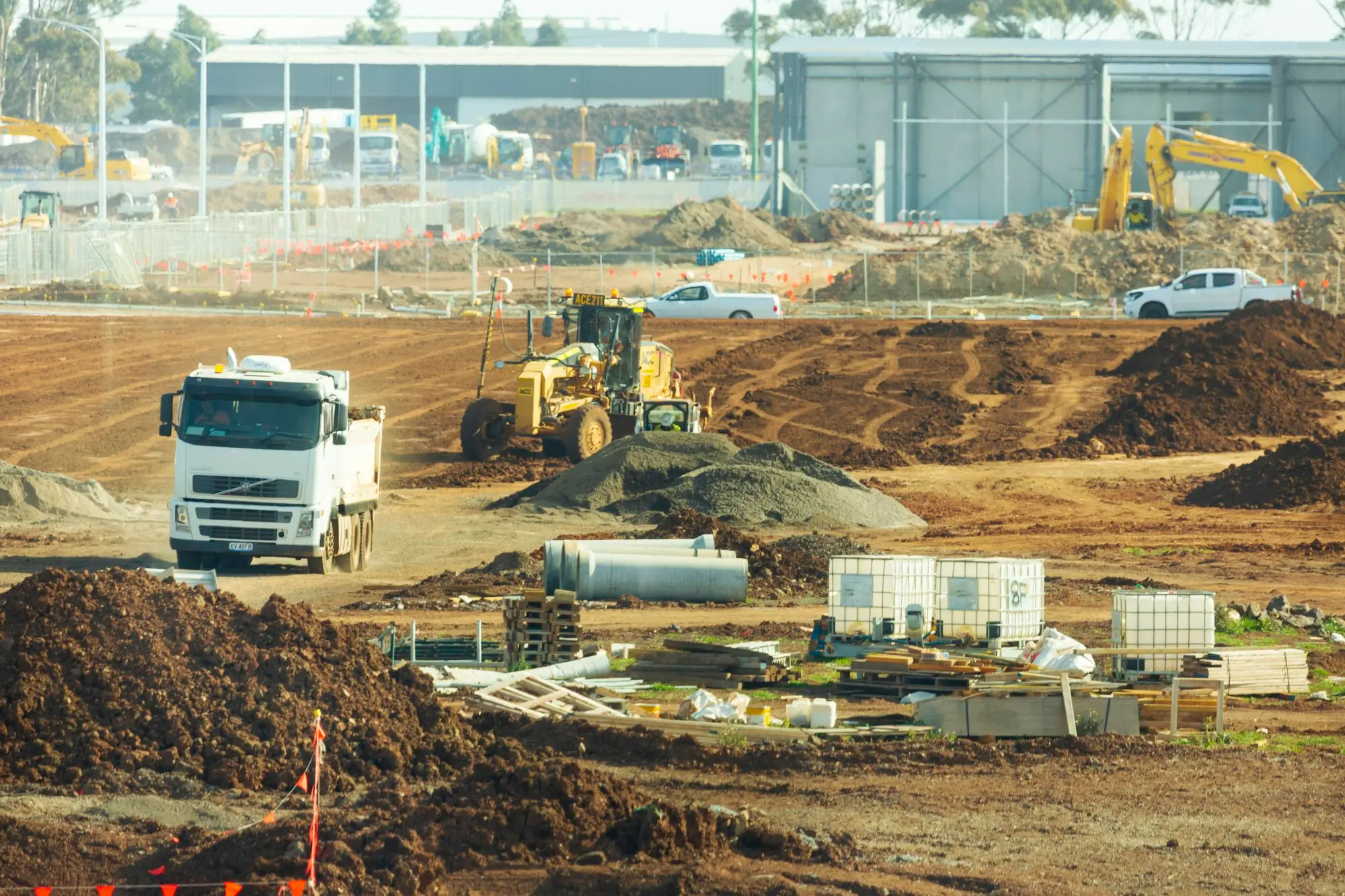 Trucks and machinery on a building site